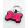Swiss silicone dog tag with emergency contacts and health information.