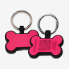 Swiss silicone dog tag with emergency contacts and health information.