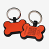 Swiss silicone dog tag with emergency contacts and health information.
