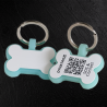 Hundemarke mit QR-Code in Knochenform aus fluoreszierendem Silikon – Schweizer Datenplattform